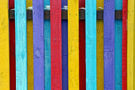 Multi-colored fence barsの写真素材