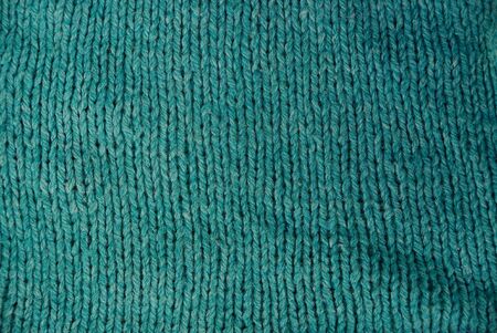 Green texture of piece of clothの写真素材