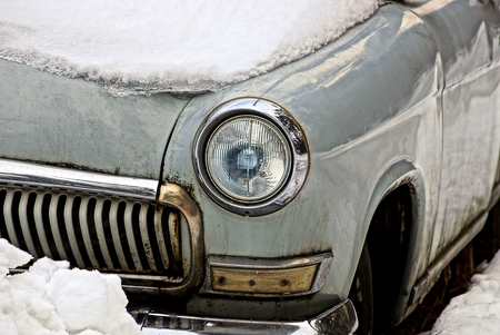 Headlight on an old gray retro carの写真素材