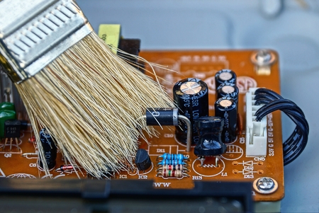 Cleaning brush dust from the chipの写真素材