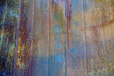 Rusty iron texture from an old metal fence wall
