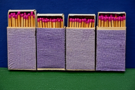 set of paper blue boxes with matchesの写真素材