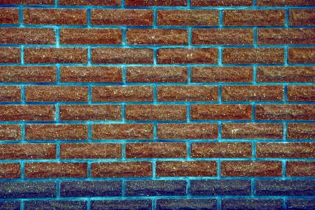 part of the wall of the house made of brown bricksの写真素材