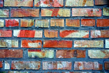 red brown texture of bricks on the wallの写真素材