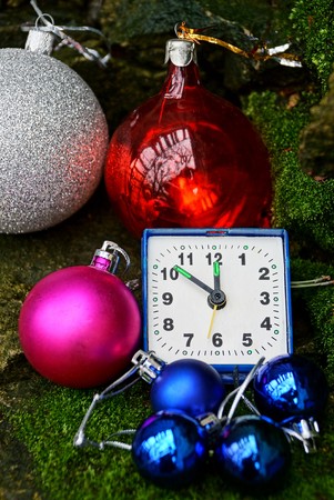 alarm clock with colored New Year's toys