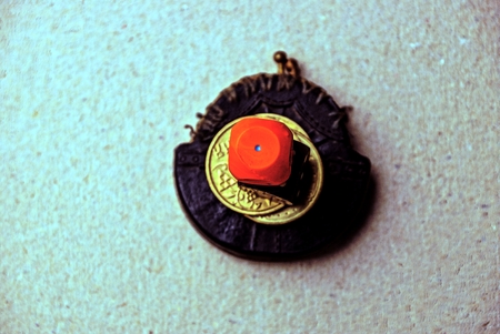coins and a purse on a gray table