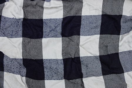 texture of a fabric of crumpled cloth with a pattern