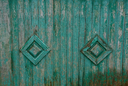 gray green wood texture of wet fence boards with patternの写真素材