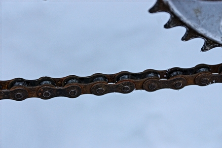 rusty bicycle chain on a bicycle sprocket