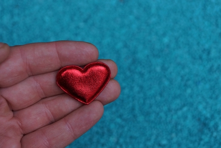 red heart on a blue backgroundの写真素材