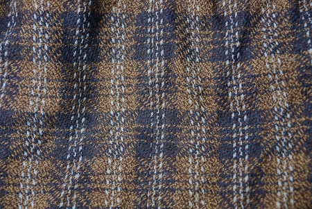 brown texture of a piece of clothing with a patternの写真素材