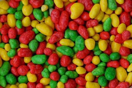 colored bright texture of small sweet candiesの写真素材