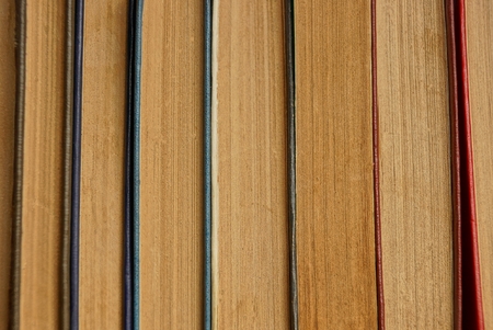 brown paper texture from a row of old booksの写真素材