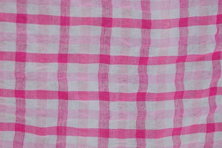 reddish white fabric texture of crumpled clothの写真素材