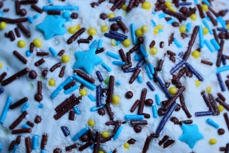 colored texture of a sweet powder on a cake