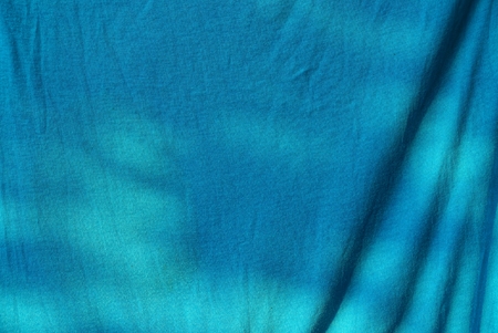 blue cloth texture on a piece of crumpled cloth on clothes