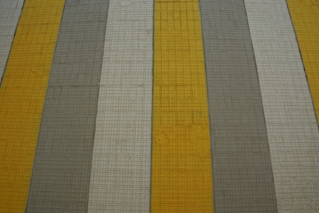 striped colored texture from road markings on asphalt