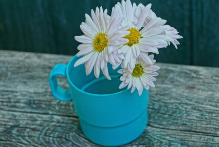 bouquet on a gray wooden tableの写真素材