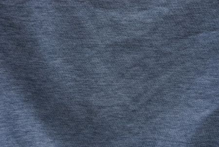 gray dark background of crumpled fabric on clothesの写真素材