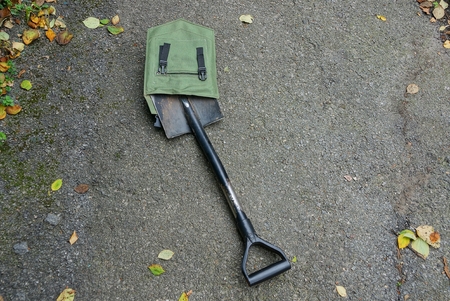 one black steel shovel