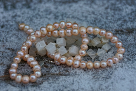 brown white beads on white snowの写真素材