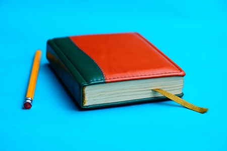 red leather notebook