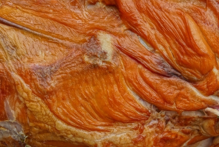 brown natural background from a large piece of smoked chicken meatの写真素材