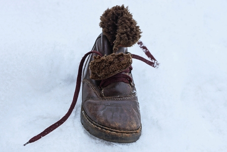 old brown leather boot with furの写真素材