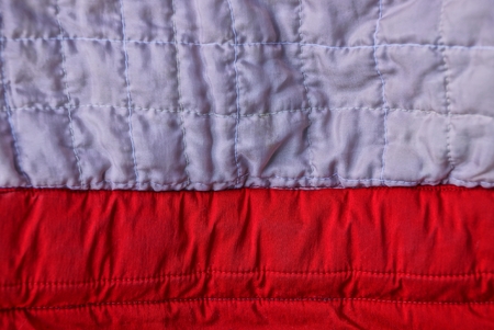 gray red background fabric with seams