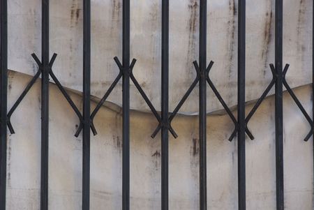 metal texture of black forged rods on a gray canvasの写真素材
