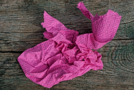 piece of crumpled red paper