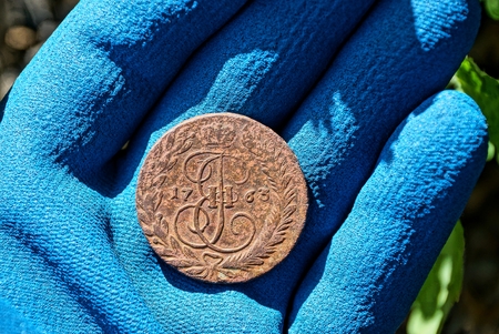 hand in blue gloveの写真素材