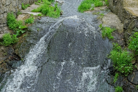 waterfalls and green vegetation