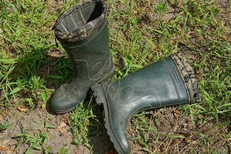 two green rubber bootsの写真素材