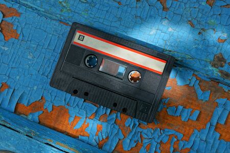 cassette is one black old audio scuffed board