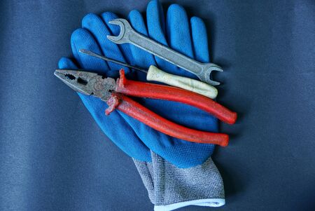 work gloves on a gray table