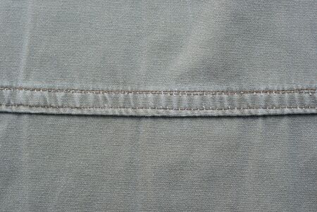gray fabric texture of a piece of cotton clothing