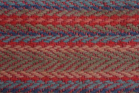 colored fabric texture from a piece of old carpet