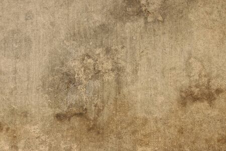 gray brown stone texture from a concrete shabby old wall