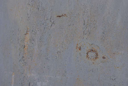 gray metal texture from an old dirty iron wall in brown rust