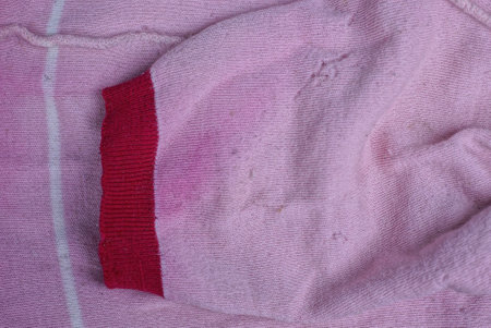 pink old dirty wool fabric texture single sleeve sweater with red stripe