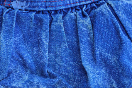 blue gray fabric texture from a piece of crumpled cotton matter on clothesの写真素材