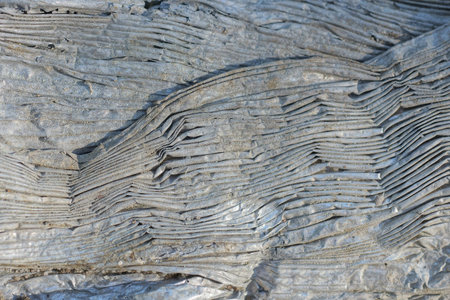 plastic texture from an old crumpled piece of gray foil