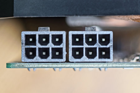 two black electrical plastic socket inputs on the video card chipの写真素材