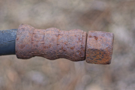 rusty bolt closeup on blurred background, macro photo with selective focusの写真素材