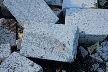Granite bricks in the city park, detail of a construction site