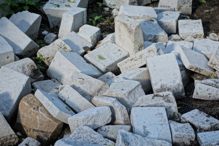 Close-up of a pile of concrete blocks in the garden.