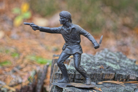 Toy soldier in the forest, selective focus, shallow DOF.