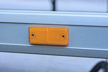 Close-up of an orange object on a metal background.の写真素材
