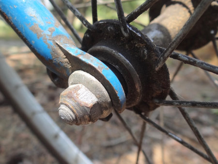 Bicycle wheel with nut and bolt, close-up, selective focusの写真素材